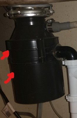 where to feel garbage disposal for overheating signs